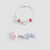 Armband mit verschiedenen Anhängern Armband mit verschiedenen Anhängern