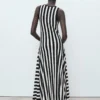 Asymmetrisches, tief ausgeschnittenes Kleid Asymmetrisches, tief ausgeschnittenes Kleid