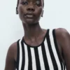 Asymmetrisches, tief ausgeschnittenes Kleid Asymmetrisches, tief ausgeschnittenes Kleid