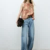 Bluse mit Blumenprint und Falten Bluse mit Blumenprint und Falten