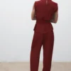 Bluse mit drapiertem Ausschnitt und Gürtel Bluse mit drapiertem Ausschnitt und Gürtel