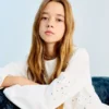 Bluse mit Perlenstickerei Bluse mit Perlenstickerei
