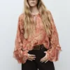 Bluse mit Rüschenprint