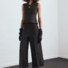 Bluse mit V-Ausschnitt und Schleifen Bluse mit V-Ausschnitt und Schleifen