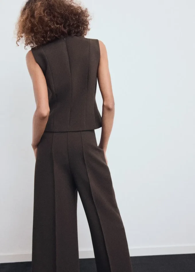 Bluse mit V-Ausschnitt und Schleifen Bluse mit V-Ausschnitt und Schleifen