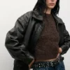 Bouclé-Pullover mit kurzen Ärmeln Bouclé-Pullover mit kurzen Ärmeln