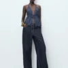 Denim-Oberteil mit V-Ausschnitt und Schleife Denim-Oberteil mit V-Ausschnitt und Schleife