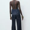 Denim-Oberteil mit V-Ausschnitt und Schleife Denim-Oberteil mit V-Ausschnitt und Schleife