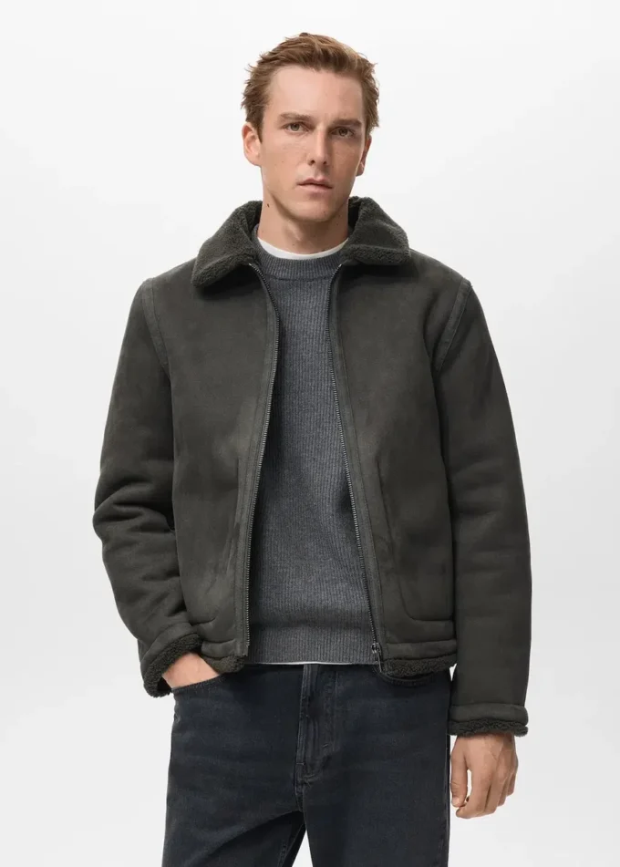 Doppelseitige Jacke mit Details aus Schaffell Doppelseitige Jacke mit Details aus Schaffell