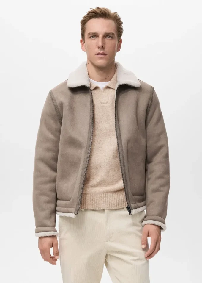 Doppelseitige Jacke mit Details aus Schaffell Doppelseitige Jacke mit Details aus Schaffell