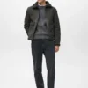 Doppelseitige Jacke mit Details aus Schaffell Doppelseitige Jacke mit Details aus Schaffell