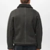 Doppelseitige Jacke mit Details aus Schaffell Doppelseitige Jacke mit Details aus Schaffell