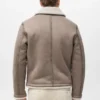 Doppelseitige Jacke mit Details aus Schaffell Doppelseitige Jacke mit Details aus Schaffell