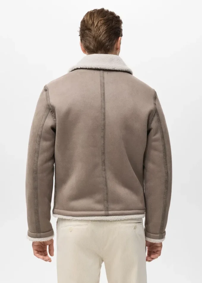 Doppelseitige Jacke mit Details aus Schaffell Doppelseitige Jacke mit Details aus Schaffell