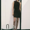 Fein gestricktes Kleid mit metallischen Details