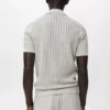 Fein gestricktes Polohemd mit Fischgrätenmuster