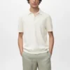 Fein gestricktes Poloshirt aus 100 % Baumwolle Fein gestricktes Poloshirt aus 100 % Baumwolle