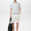 Fein gestricktes Poloshirt aus 100 % Baumwolle Fein gestricktes Poloshirt aus 100 % Baumwolle