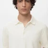 Fein gestricktes Poloshirt aus 100 % Baumwolle Fein gestricktes Poloshirt aus 100 % Baumwolle