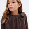 Geraffte, bestickte Bluse Geraffte, bestickte Bluse