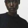 Gerippter Pullover mit Schößchen