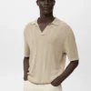 Geripptes Strick-Poloshirt Geripptes Strick-Poloshirt