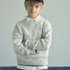 Gespeckter Wollpullover Gespeckter Wollpullover