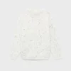Gespeckter Wollpullover Gespeckter Wollpullover