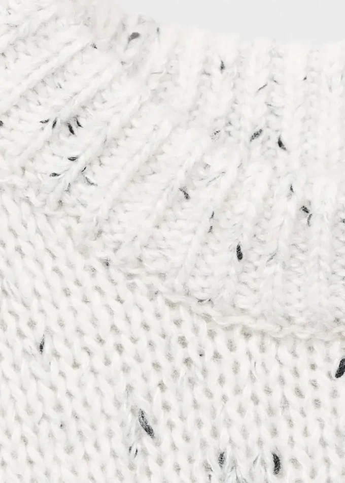 Gespeckter Wollpullover Gespeckter Wollpullover