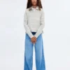 Gestreifter Rollkragenpullover Gestreifter Rollkragenpullover
