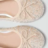 Glitzernde Ballerinas mit Schleife Glitzernde Ballerinas mit Schleife