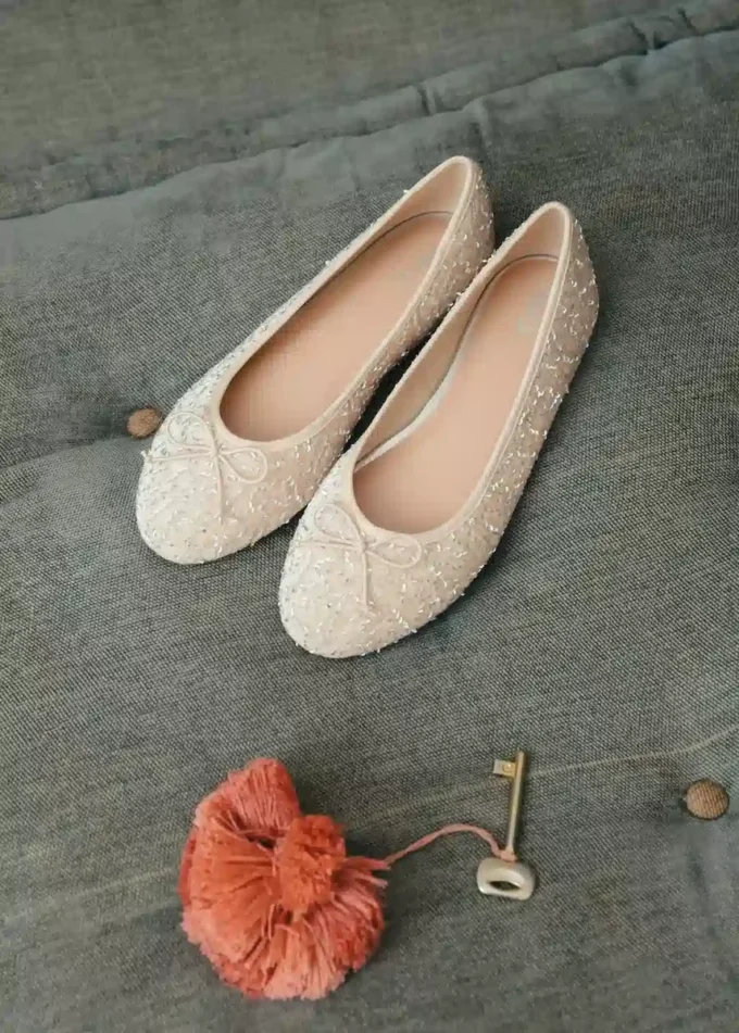 Glitzernde Ballerinas mit Schleife Glitzernde Ballerinas mit Schleife