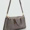 Glänzende Handtasche mit Griffen Glänzende Handtasche mit Griffen