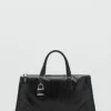 Glänzende Handtasche mit Griffen Glänzende Handtasche mit Griffen