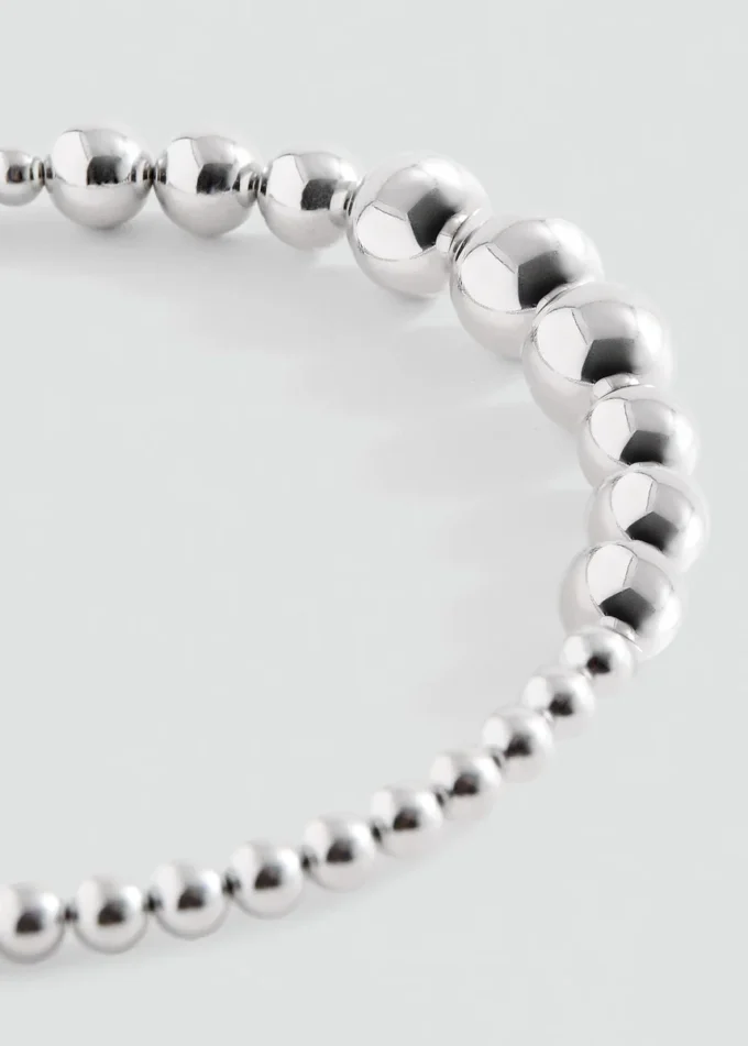 Haarband mit Perlenapplikation Haarband mit Perlenapplikation