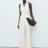 Halterneck-Jumpsuit mit Gürtel