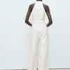 Halterneck-Jumpsuit mit Gürtel