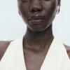 Halterneck-Jumpsuit mit Gürtel