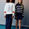 Jeanshose mit Knopfleiste Jeanshose mit Knopfleiste