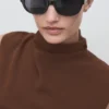 Jumpsuit mit drapiertem Ausschnitt und Gürtel