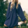 Kariertes Kleid mit Stickerei Kariertes Kleid mit Stickerei