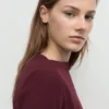 Kleid mit Bootsausschnitt und Rüschen Kleid mit Bootsausschnitt und Rüschen
