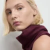 Kleid mit kombiniertem Trichterkragen Kleid mit kombiniertem Trichterkragen