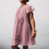 Kleid mit Perlenstickerei Kleid mit Perlenstickerei