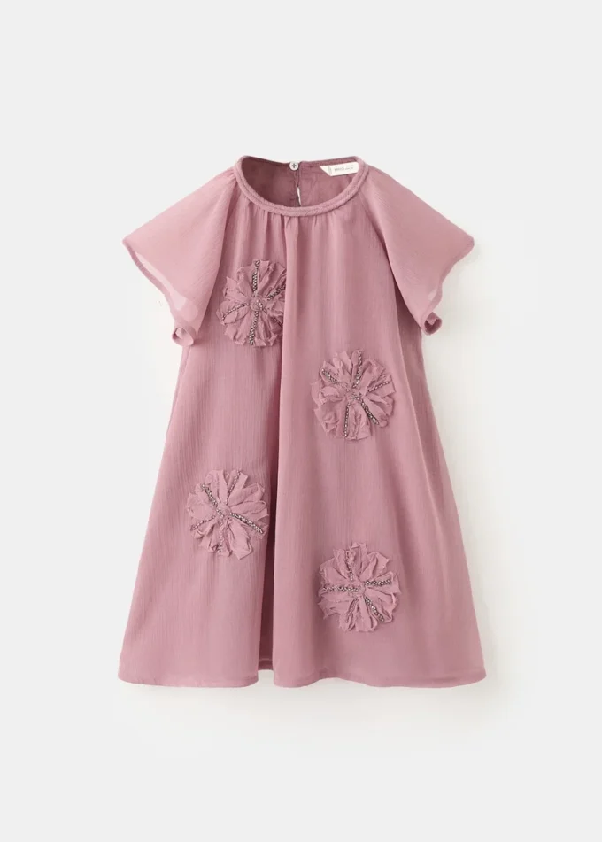 Kleid mit Perlenstickerei Kleid mit Perlenstickerei