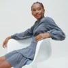 Kleid mit Rüschen und Pailletten Kleid mit Rüschen und Pailletten
