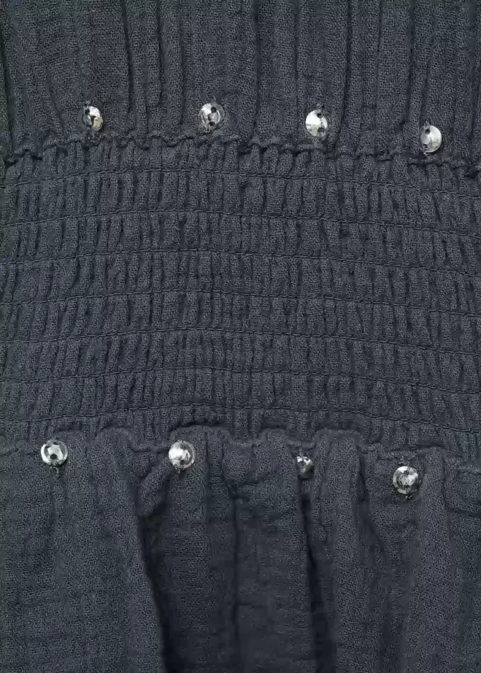Kleid mit Rüschen und Pailletten Kleid mit Rüschen und Pailletten