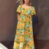 Kleid mit tropischem Print Kleid mit tropischem Print
