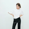 Kunstlederhose mit Nieten