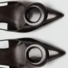Lackleder-High-Heels mit Ringdetail Lackleder-High-Heels mit Ringdetail